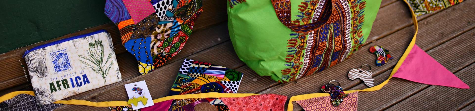 A green bag featuring a map of Africa printed on its surface.